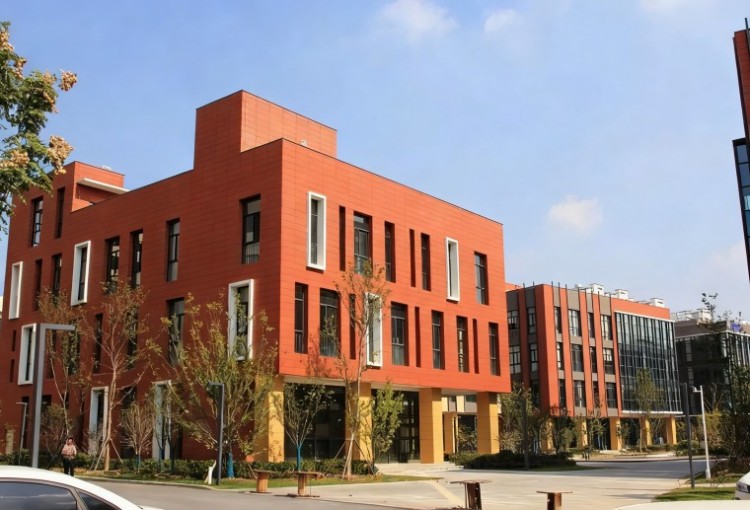 Orange-toned terracotta facade at Nagpur Eco-Tech Campus Orange-toned terracotta facade at Nagpur Eco-Tech Campus
