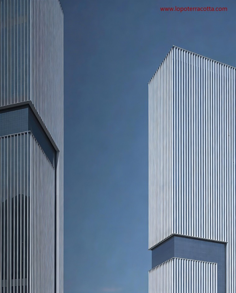 Close view showing the engineered ceramic cladding system designed for high-altitude wind performance.